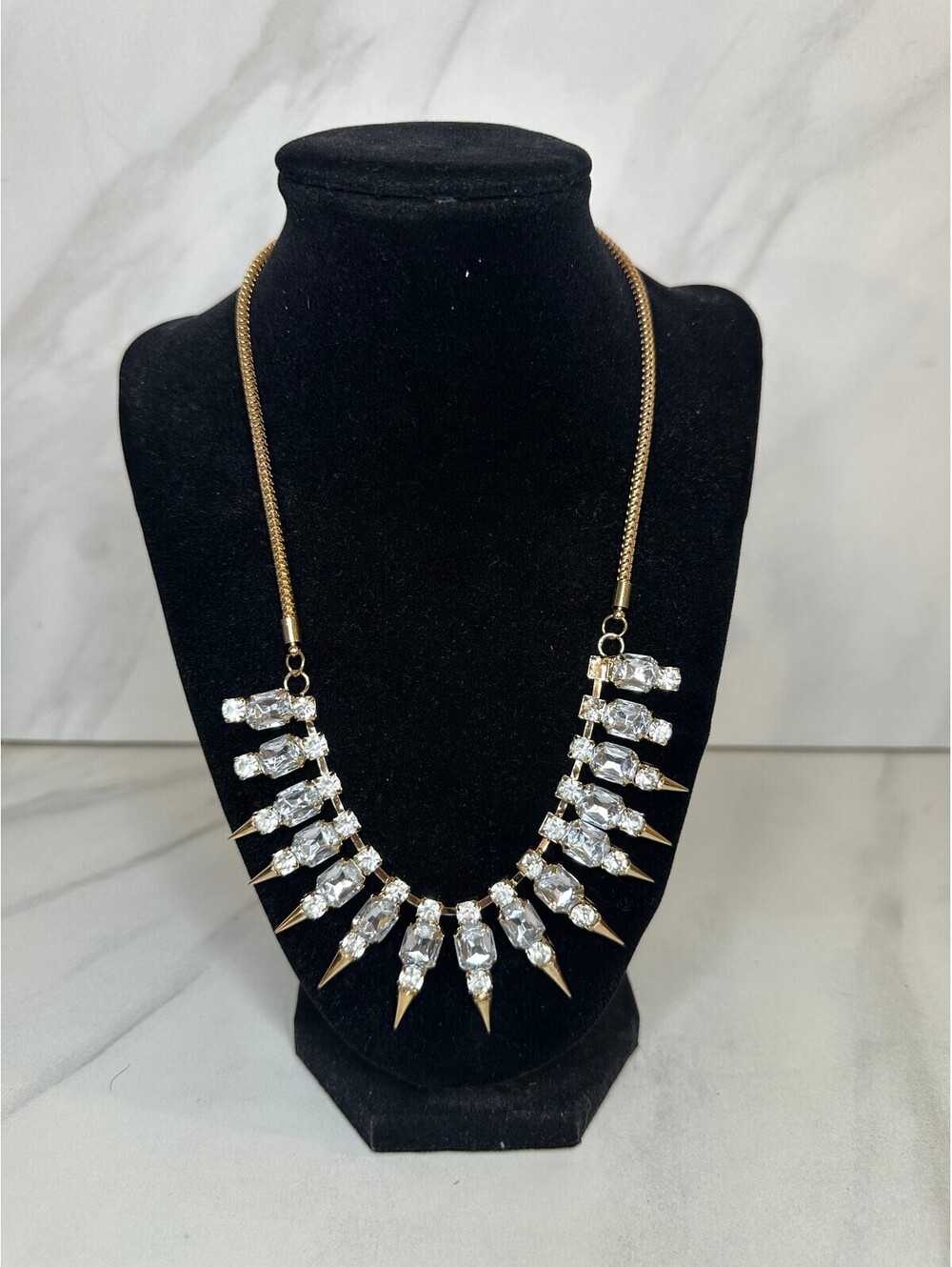 Crystal rhinestone gold tone spike statement bib necklace